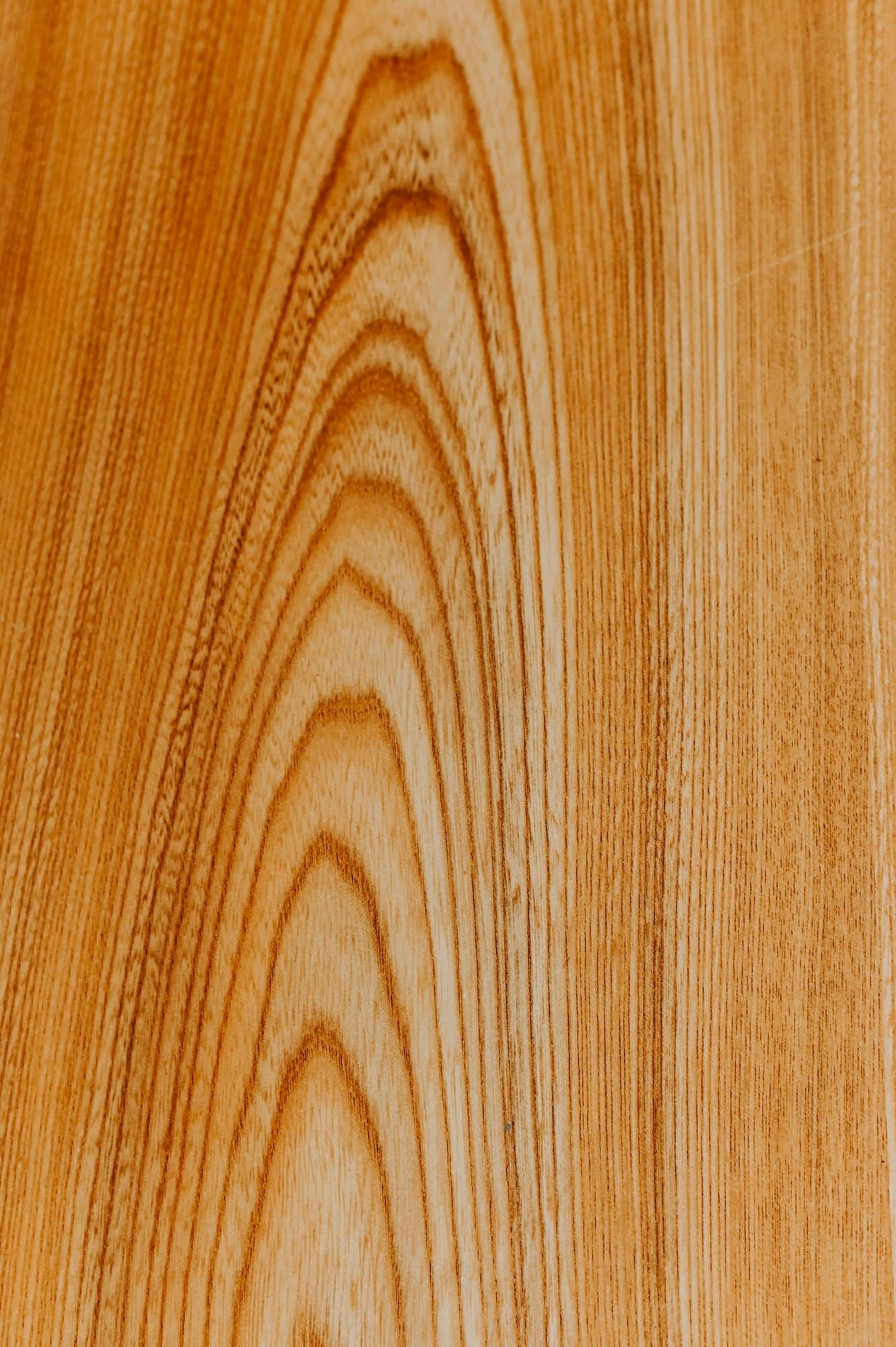 Reclaimed, teak-toned timber grain (Reference image, not a CHAYP project)